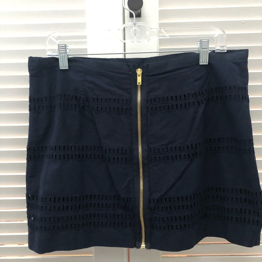 Navy mini skirt with cutouts